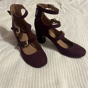 Closed toe, maroon heels.